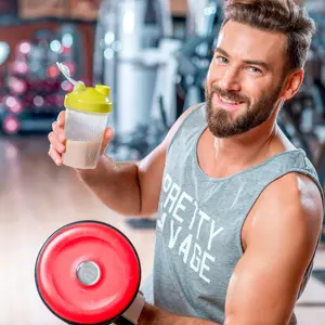 Man drinking post-workout protein shake