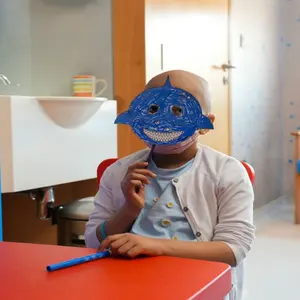 There's a way to make wearing the mask more fun and colorful! Some kids like to decorate their masks with art.