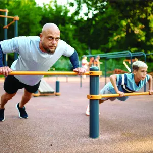 A man exercising together with his son