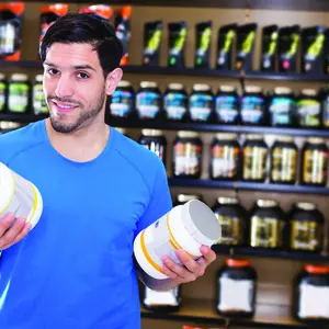 A man holding a jar