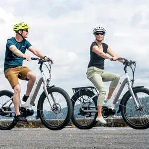 Man and woman riding electric bicycles