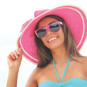 A lady with a pink Hat