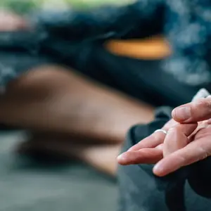 close-up of person practicing mudras