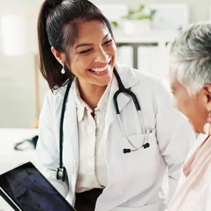 Doctor advising older patient