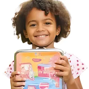 Girl holding her lunch box