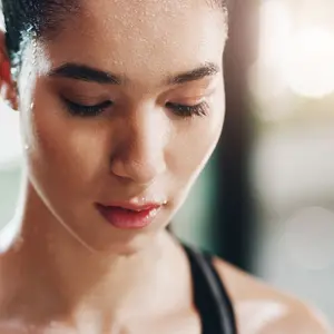 female athlete sweating after workout
