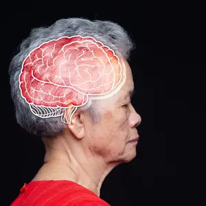 Senior woman in profile with a brain illustration