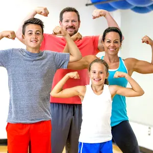 A family flexing their muscles