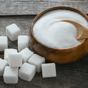 sugar cubes in wooden dish
