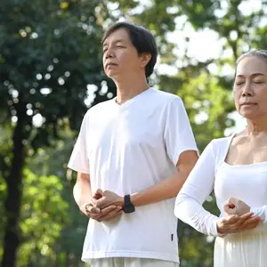 senior couple doing Qi Gong