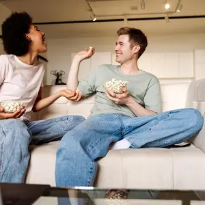 Couple eating popcorn